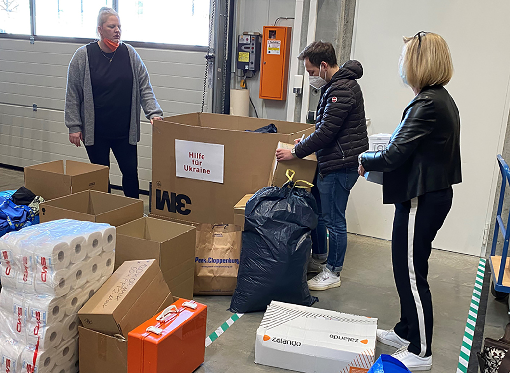 Robos-labels employees examine and sort the incoming donations in kind.