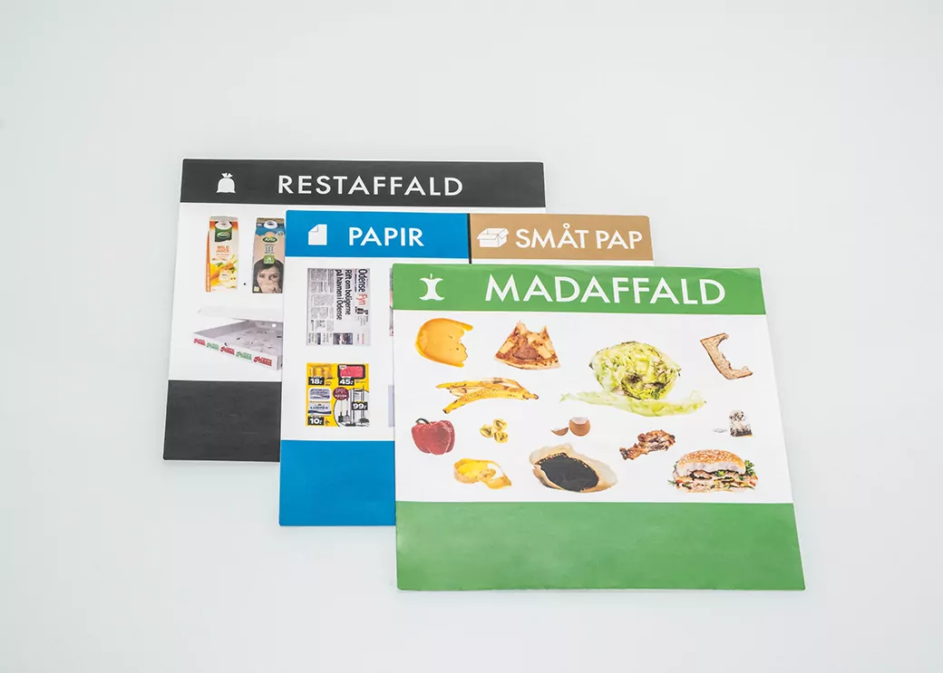 Various label types for garbage containers in bold and brilliant colors.