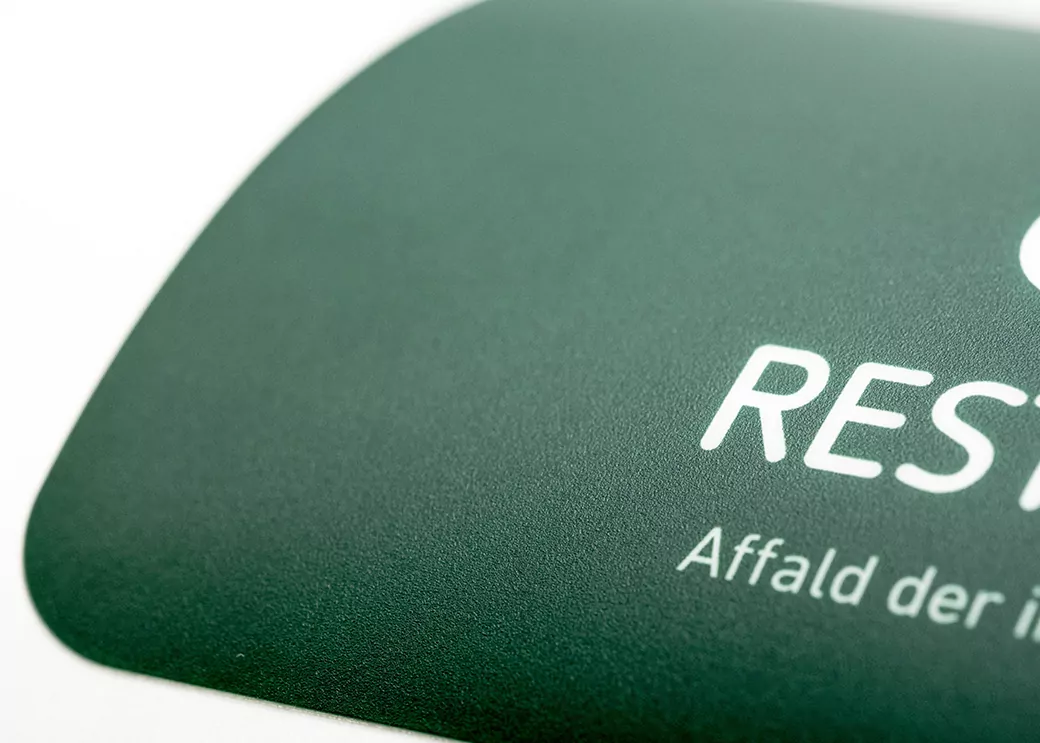 A large-area label made of polycarbonate, protected against mechanical load like e.g. hits and scratches.
