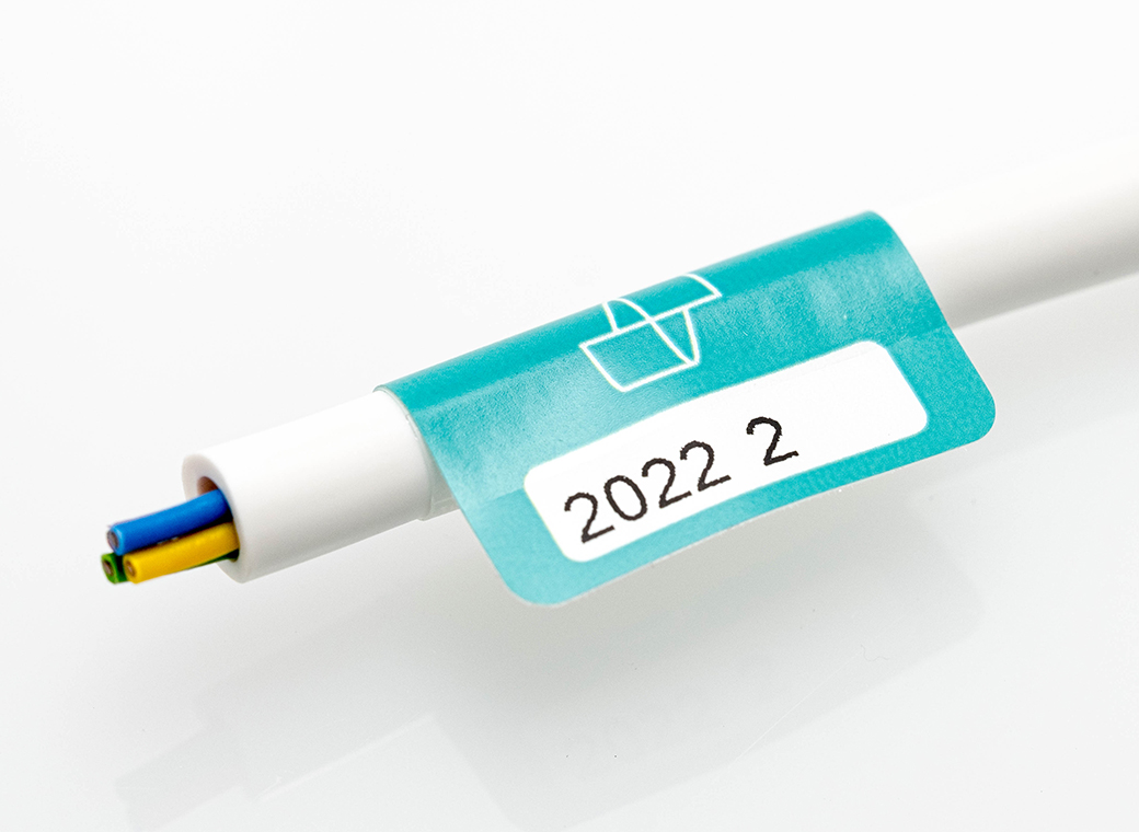 The RoHS directive affects every company which distributes electric and electronic equipment (EEE) in countries which are covered by RoHS directive. This also includes cables and parts for electric and electronic equipment. Robos-labels produces standard-compliant wrap-around cable labels.