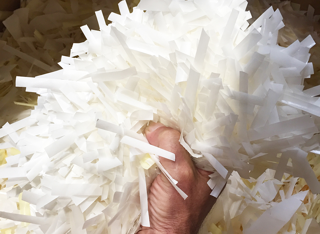 The release liner of the marginal strips – a waste product of the label manufacturing that results for technical reasons. The marginal strips will be vacuumed and sent to recycling.