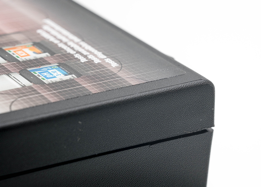 The structured plastic surface requires labels with a special adhesive for the blister-free result.
