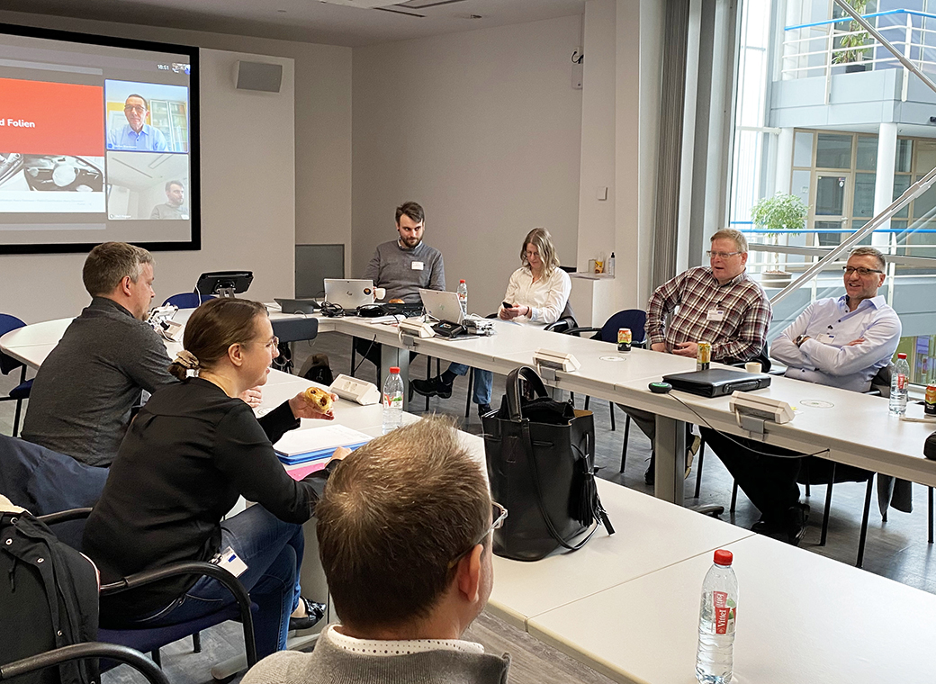 In the training room at Avery Dennison during a presentation on adhesives and specifications in the automotive industry.